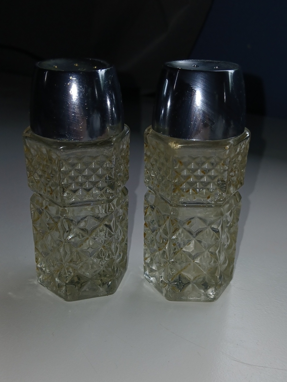 Vintage Cut Glass Salt and Pepper Shakers with Silver Caps - Clear
